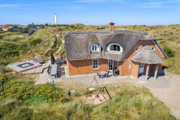 Villa für 12 Personen, mit Pool und Whirlpool sowie Sauna, mit Haustier in Blavand