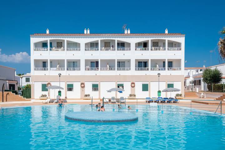 Entire apartment, In a well-kept holiday resort with communal pools - Apartment Cala Piques in Cala Blanes, Ciutadella