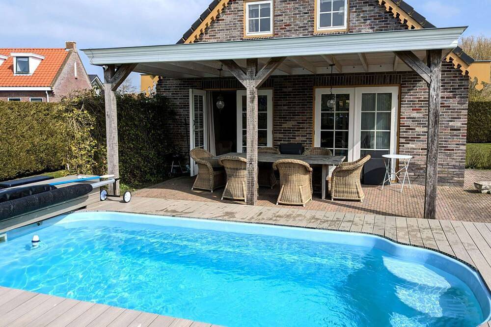 Gemütliches Ferienhaus mit beheiztem Pool, Garten und überdachter Terrasse in Franekeradeel, Niederländische Nordsee