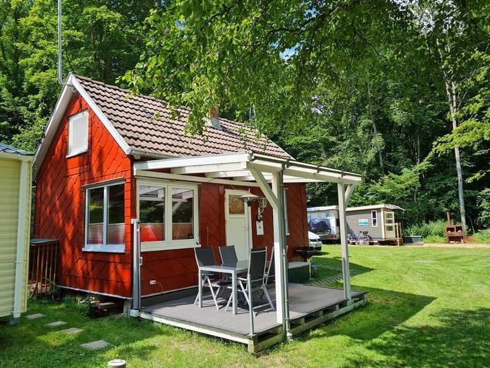 Ferienhaus für 5 Personen, mit Terrasse und Seeblick sowie Ausblick in Thüringische Rhön
