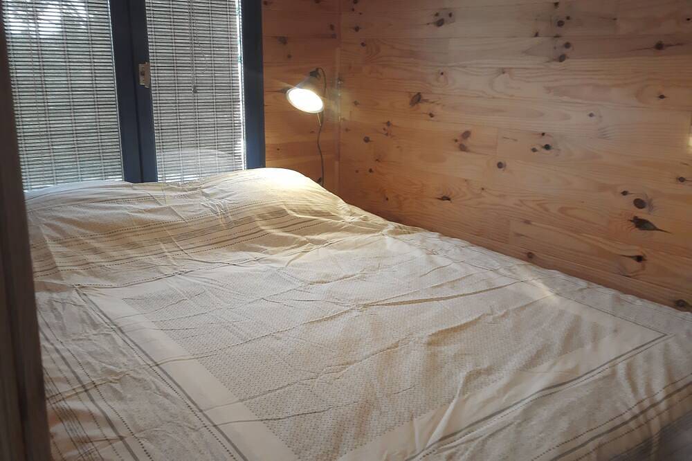 Chalet perched between river and lake in Villefranche-de-Panat, Aveyron (desambiguación)