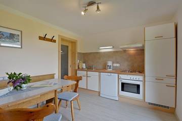 Ferienhaus für 6 Personen, mit Terrasse und Ausblick sowie Seeblick in Walchsee