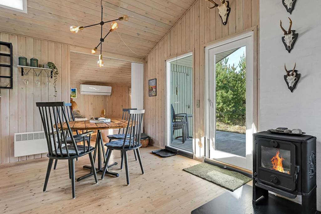 Small, cosy holiday home with annex and great wooden terraces in Ulfborg, Nissum Fjord