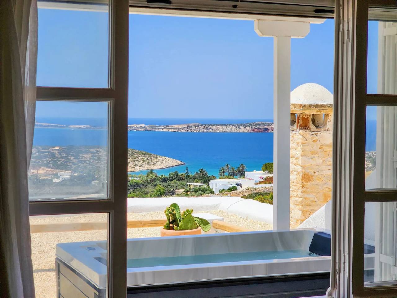 Luxury Paros Suite | Suite Orchid | Exclusive Suite with Furnished Terrace in Sarakiniko, Paros