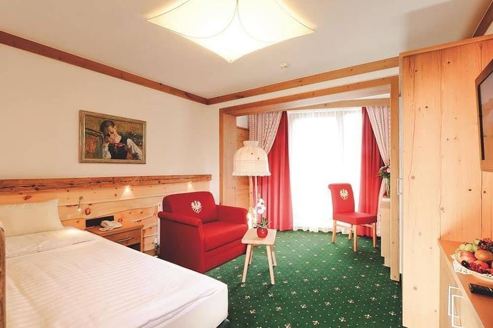 Einzelzimmer mit französischem Balkon - Das Kaltschmid - Familotel Tirol in Seefeld in Tirol, Innsbruck Land