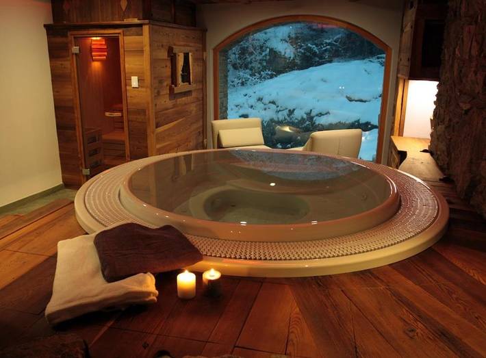 Location de vacances pour 3 personnes, avec Balcon et Jacuzzi ainsi que Jardin et Sauna dans Courtil