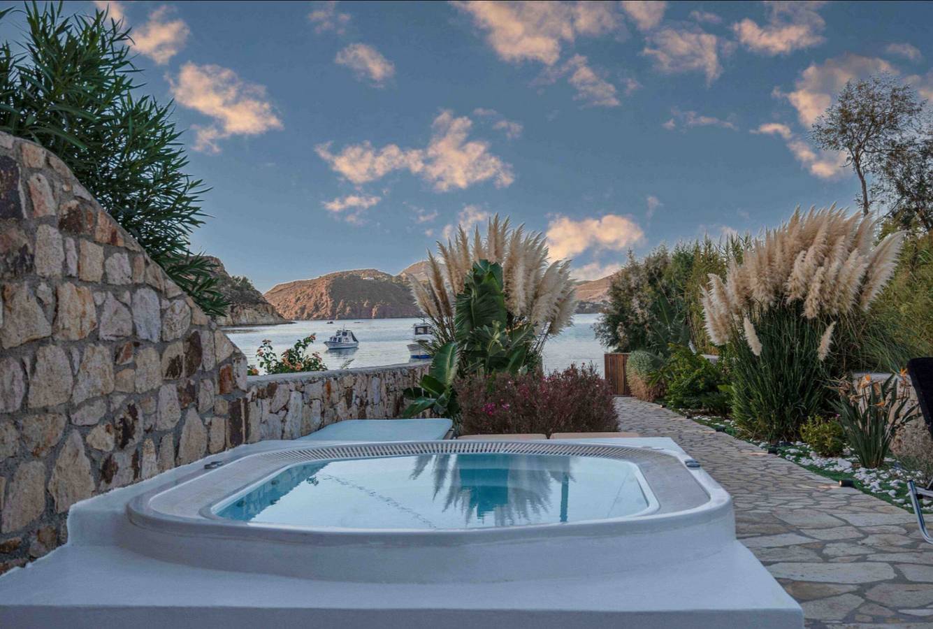 Thrilling Patmos Villa | Celestial Villa | Breathtaking Views of the Crystal-Clear Waters and Sandy Beach | Private Furnished Terrace with Mini Pool/Jacuzzi | Peaceful Outdoor Ambiance | Prime Location in Dodekanes