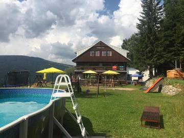 Ferienhaus für 4 Personen, mit Pool und Ausblick sowie Sauna und Garten, mit Haustier in Spindlermühle