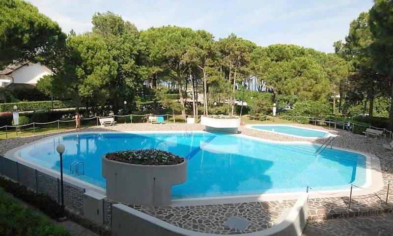 Ferienwohnung für 4 Personen, mit Terrasse und Garten sowie Pool in Lignano Riviera