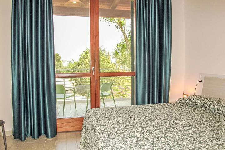 Gemütliche Wohnung in einem Ferienhaus für 4 Gäste mit Klimaanlage,  W-Lan, TV und Terrasse in Comacchio, Ferrara Provinz