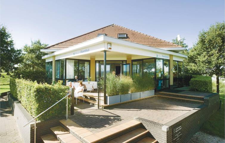 Huisje aan zee voor 8 personen, met terras en uitzicht op het meer in Buren Gemeente
