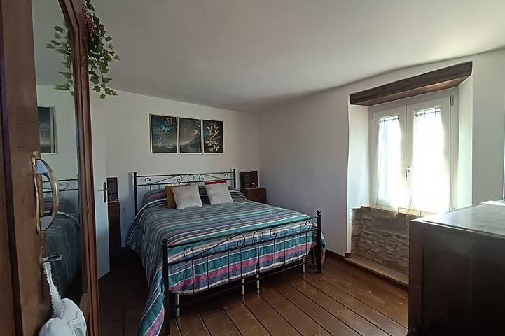 Ferienhaus für 4 Personen, mit Balkon und Garten