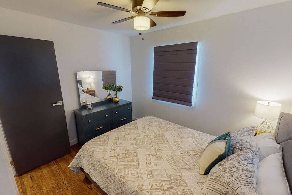 Stylish Mid-Century Home | 4Br | 2 King Beds | Sleeps 10 | Big Backyard in Wichita, Kansas