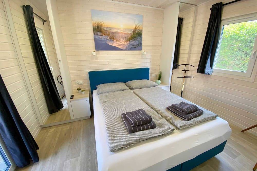 Wassermann vacation home with box-spring beds and large terrace in Wunstorf, Steinhuder Meer