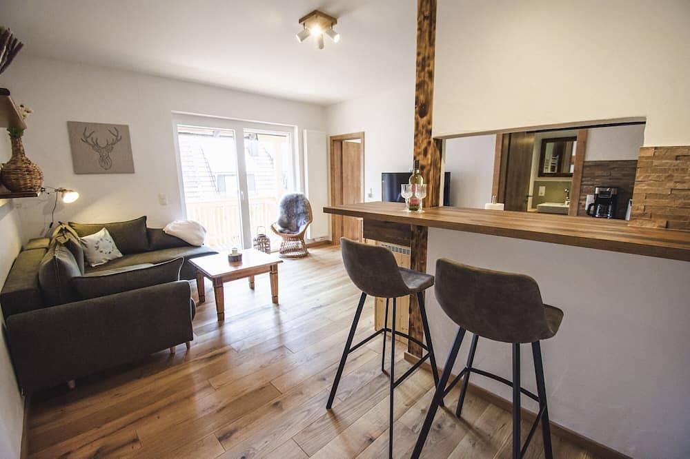 Ganze Wohnung, New, romantic Rotmilan holiday apartment with a view of the mountains in Bischofsheim an der Rhön, Rhön-Bayern