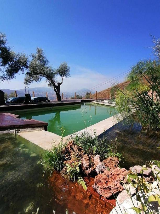 Casa rural para 9 personas, con Terraza y Jardín además de Piscina y Vistas al lago en Lanjarón