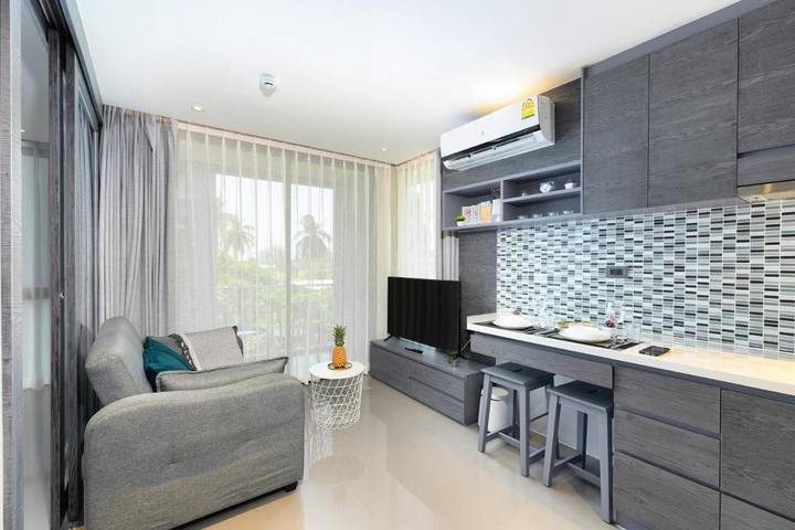 Lägenhet för 2 Personer, med barnpool samt trädgård och pool i Kamala