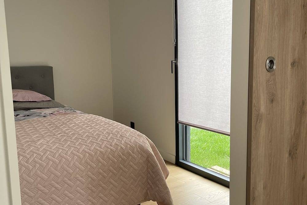 Logement de charme tout neuf et très bien équipé situé dans jardin privé. in Kingersheim, Région de Mulhouse