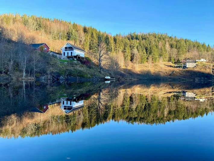 Familienhaus mit Ruderboot und Sauna am See in Porsgrunn