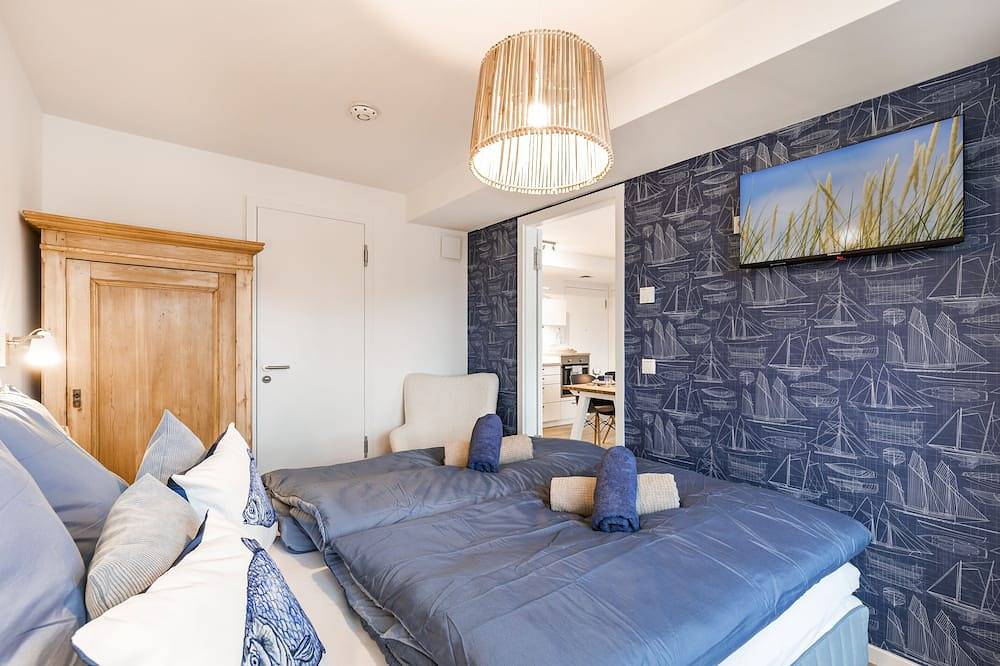 Geheel appartement, Sea view for 4 people, 2 en-suite bathrooms, balcony, directly on the beach in Prora, Binz