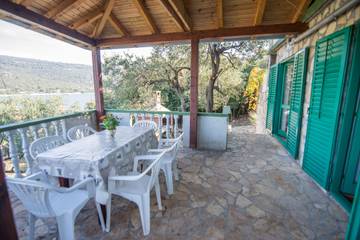 Ferienhaus für 8 Personen, mit Balkon/Terrasse, mit Haustier auf Pasman