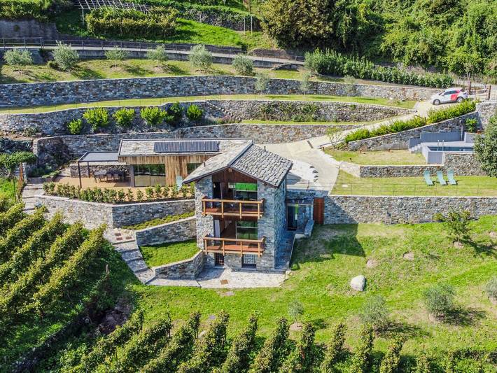 Ferienhaus für 7 Personen, mit Ausblick und Seeblick sowie Balkon und Garten