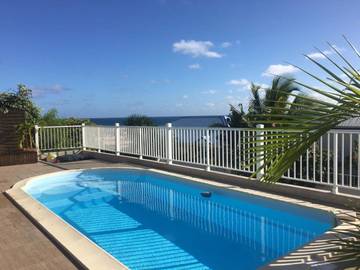 Maison de vacances pour 8 personnes, avec vue ainsi que piscine et jardin en Guadeloupe