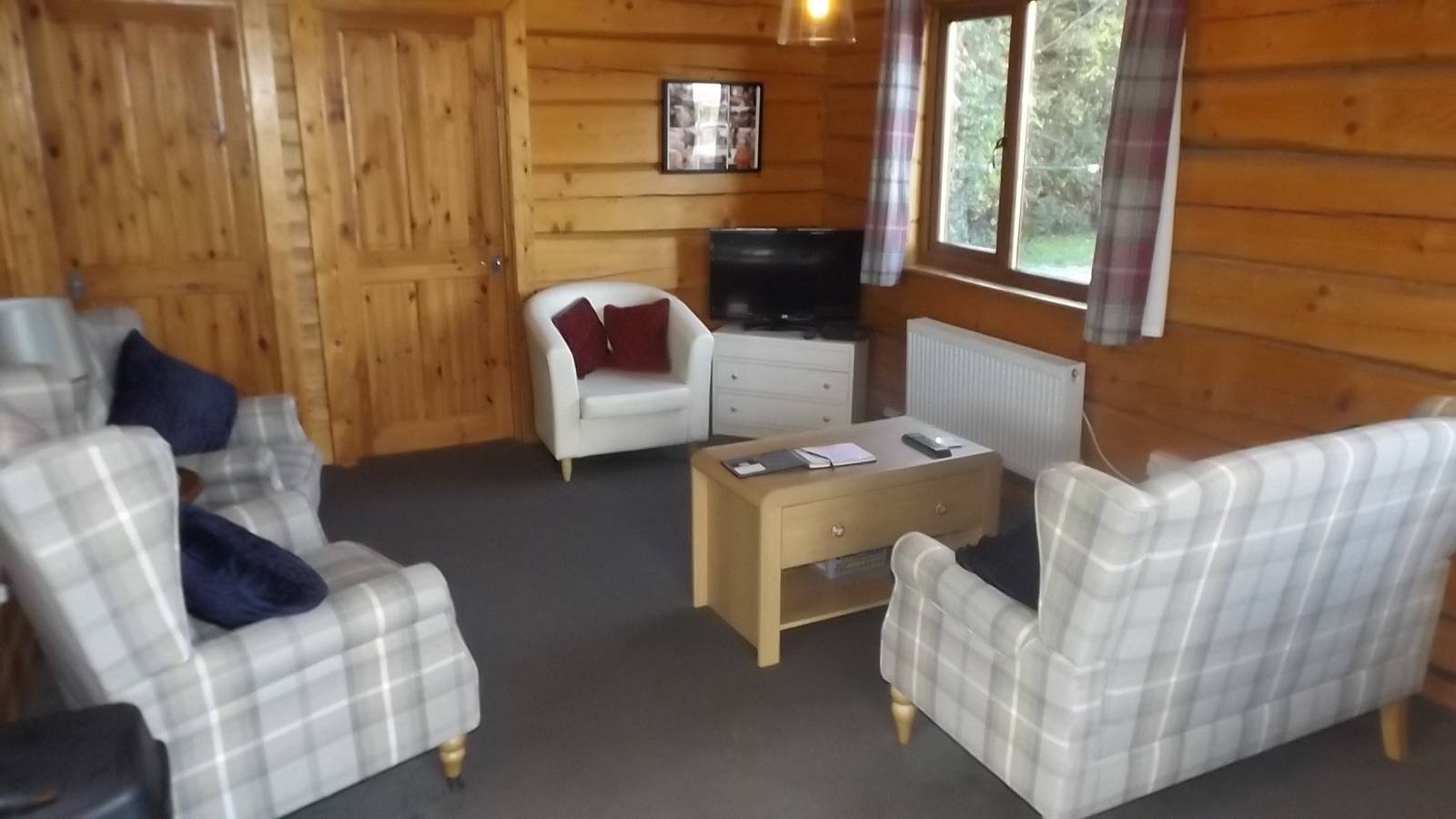 Hand built log cabin at Avonvale Holiday Lodges in Aldington (Worcestershire), Worcestershire