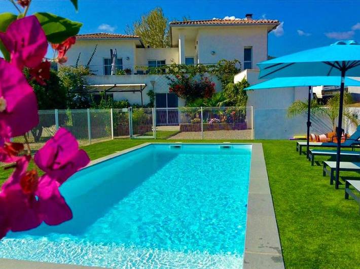 Appartement de vacances pour 5 personnes, avec jardin ainsi que piscine et vue, adapté aux familles