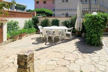 Gîte pour 6 personnes, avec jardin dans San Giovanni Sardinia
