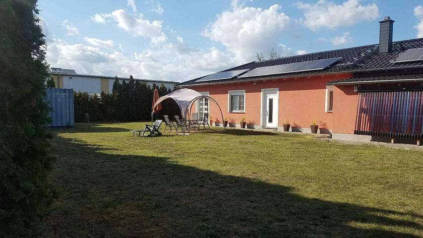 Ferienwohnung für 4 Personen, mit Garten und Ausblick am Cospudener See