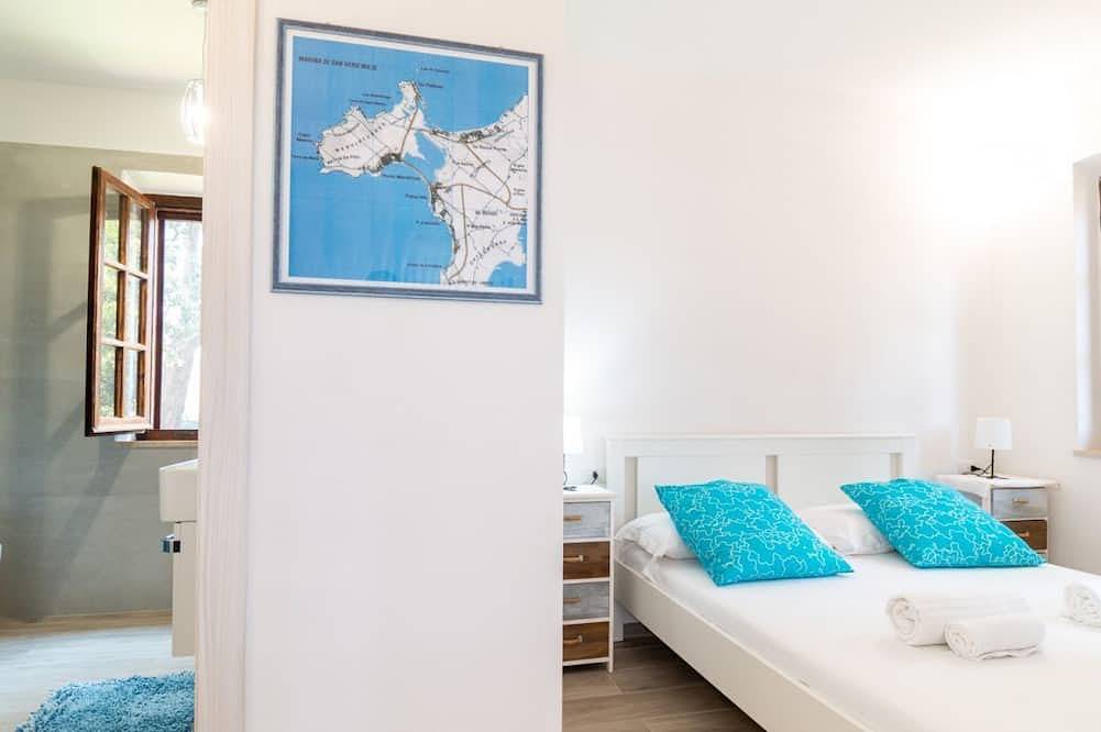 Ganze Wohnung, Dein entspannter Rückzugsort in Mandriola, nur wenige Schritte vom Meer entferntwillkommen im Apartment Corallo, einem gemütlichen Studio in Mandriola, nur 3 Gehminuten vom Strand entfernt. Ideal für alle, die einen erholsamen und komfortablen Urlaub in Mandriola, Sardinien