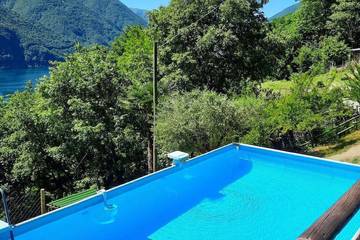 Ferienhaus für 4 Personen, mit Garten und Pool in Gemeinde Porlezza