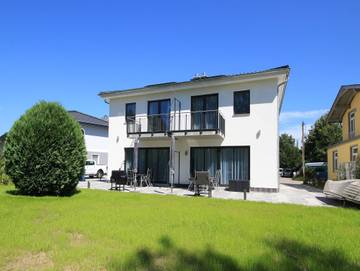 Ferienhaus für 6 Personen, mit Garten und Sauna sowie Balkon, kinderfreundlich in Göhren