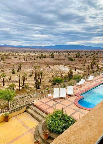 Chambre d’hôte pour 4 personnes, avec bassin pour enfant et vue ainsi que jardin et piscine dans N'kob