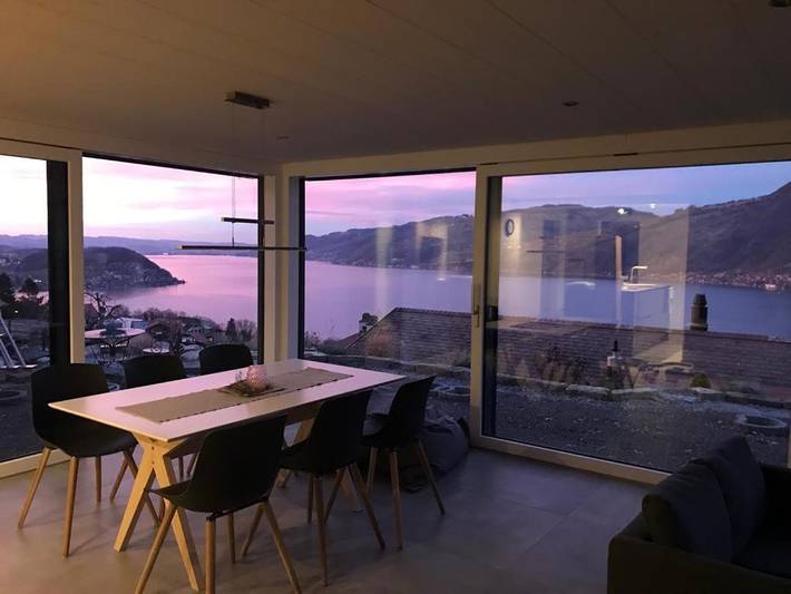 Gîte pour 4 personnes, avec vue ainsi que vue sur le lac et jardin à Krattigen