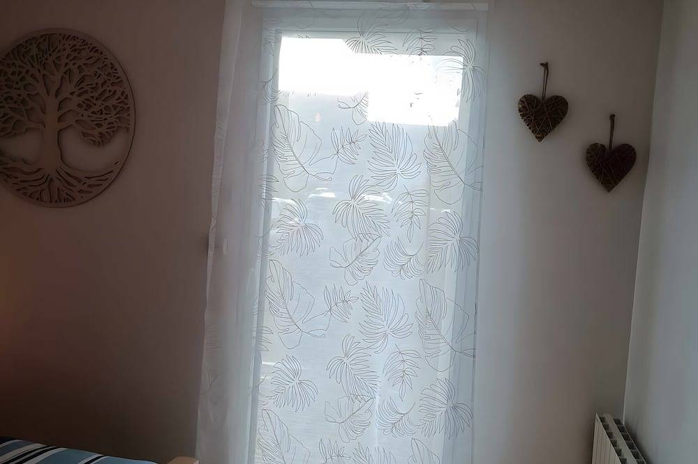 Apartamento entero, Casa vacacional «Estancia en Quimperlé» con terraza privada, jardín y Wi-Fi in Quimperlé, Region de Quimper