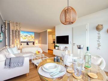 Ferienpark für 3 Personen, mit Ausblick und Sauna sowie Balkon und Seeblick in Heiligenhafen