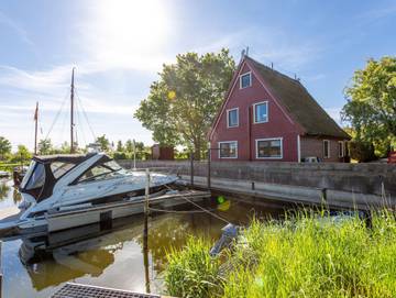 Ferienwohnung für 5 Personen, mit Garten und Terrasse sowie Seeblick, mit Haustier in Kröslin