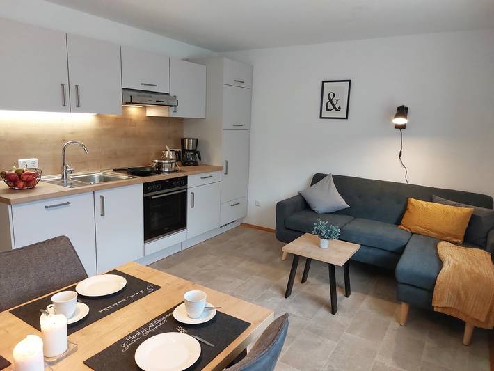Ferienwohnung für 4 Personen, mit Balkon und Balkon/Terrasse sowie Terrasse und Garten