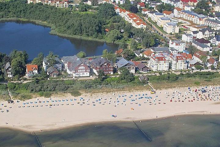 Ferienwohnung für 4 Personen, mit Terrasse und Garten sowie Sauna und Seeblick in Drei Kaiserbäder, Heringsdorf
