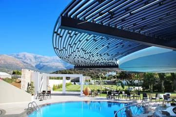 Cottage pour 3 personnes, avec bassin pour enfant ainsi que piscine et jardin à Agios Nikolaos