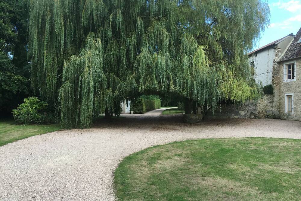 Coeur de Combray, sleeps 44 with pool & function space set in beautiful gardens in Ernes, Région de Caen