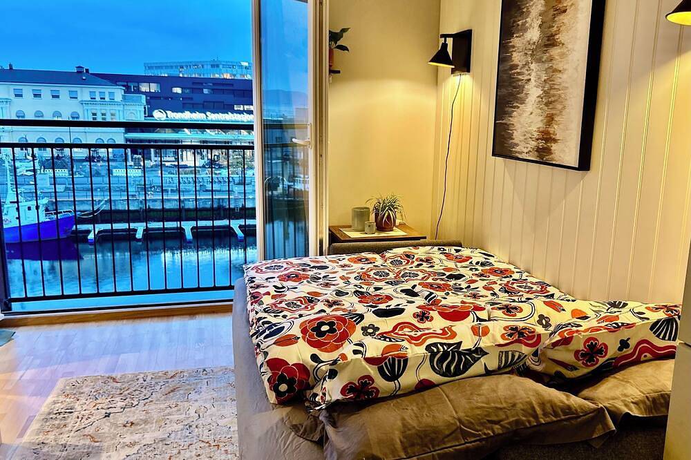 Entire apartment, Family-friendly Riverside penthouse right in the heart of Trondheim city center! in Trondheim