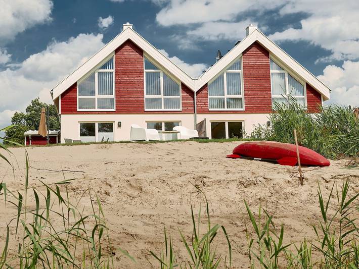 Ferienhaus für 6 Personen, mit Seeblick und Garten sowie Terrasse und Sauna, mit Haustier