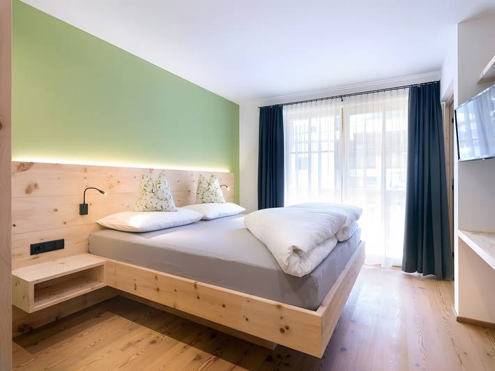 Ferienwohnung für 2 Personen, mit Balkon und Garten sowie Sauna in Toblach