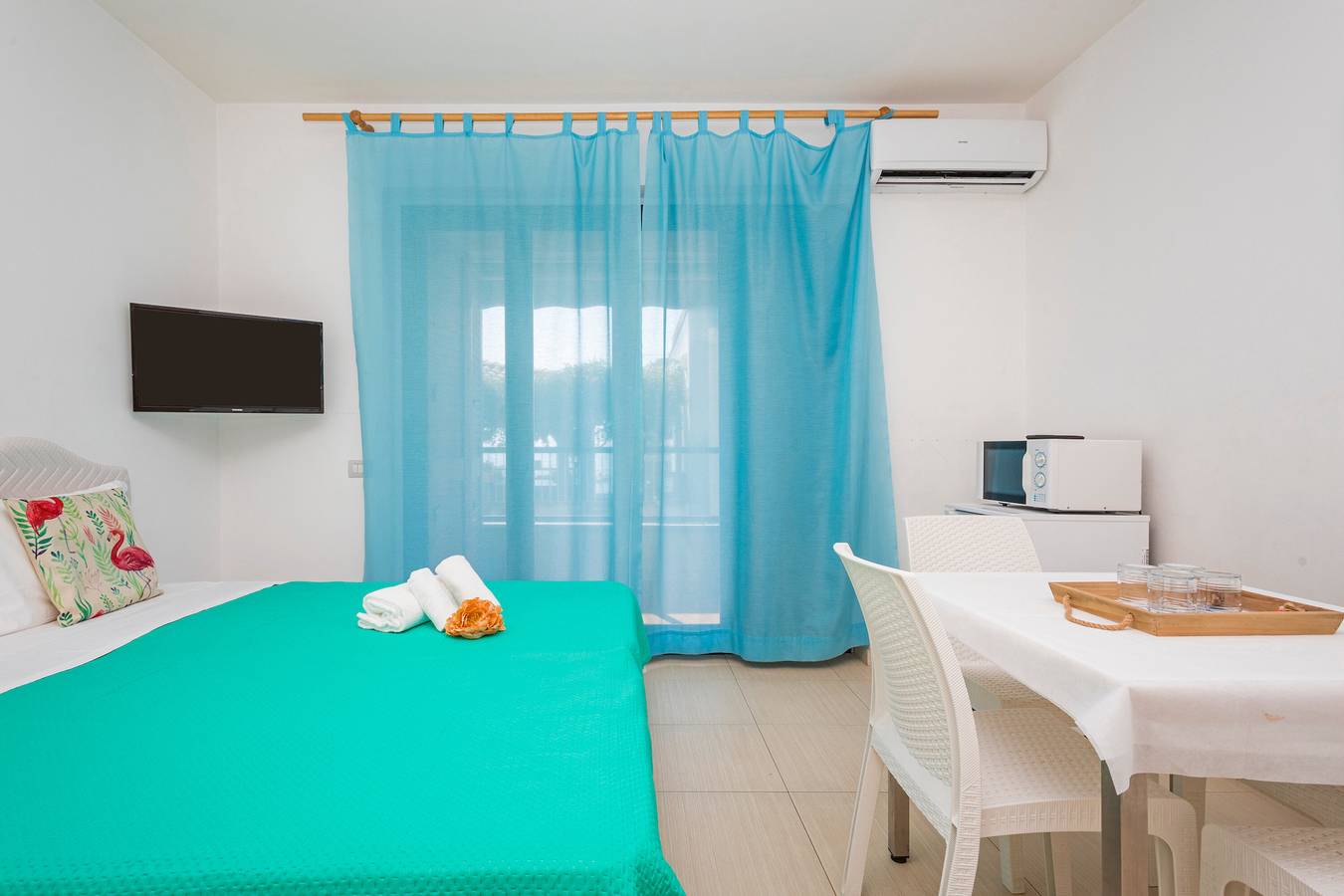 Apartamento entero, Apartamento 'Piano Terra 101' con terraza compartida, Wi-Fi y aire acondicionado in Giardini-Naxos, Provincia de Messina