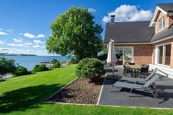 Ferienhaus mit Meerblick für 8 Personen, mit Sauna und Garten sowie Seeblick und Ausblick, mit Haustier