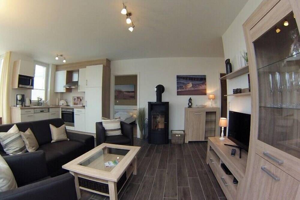 Ganze Wohnung, Hochwertige Ferienwohnung Ostseebrise 10 in Großenbrode. Balkon mit einem Elektro-Tischgrill & herrlichem Meerblick. Wohltuende Wellnessmomente in der Sauna oder im Whirlpool genießen. in Großenbrode, Ostholstein