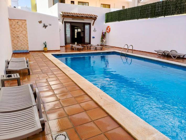 Casa de huéspuedes, con Balcón además de Terraza y Piscina en Sant Antoni de Portmany